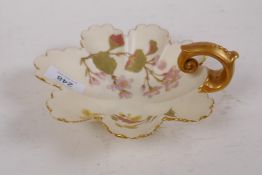 A Royal Worcester leaf shaped bowl with floral decoration and gilt highlights, stamped to base 1404,