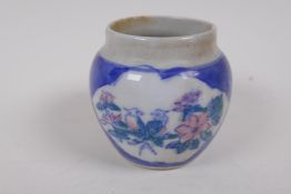 A Chinese porcelain bird feeder decorated with birds on a floral branch, AF, 6cm high