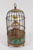 A cloisonne and brass birdcage mantel clock, 17cm high, winder absent