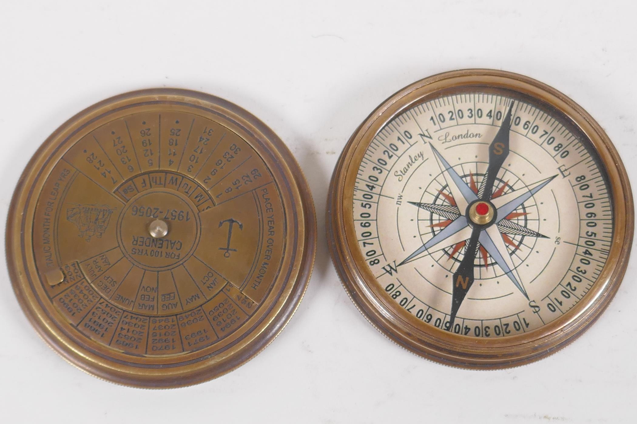 A brass cased pocket compass, 8cm diameter - Image 3 of 3