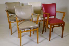 Four mid century lacquered beechwood and leatherette elbow chairs