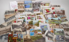 A collection of more than 400 postcards, greetings and topographical, including Sussex