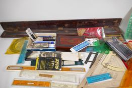 A quantity of architect's drawing instruments including Rotring pens, Thornton slide rule, cased set