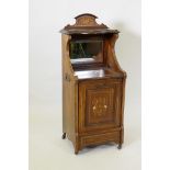 A Victorian inlaid rosewood purdonium with a mirror back, raised on castors, 39 x 35cm, 100cm high