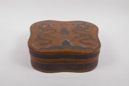 A Chinese lacquer fan shaped box, with engraved and painted dragon decoration to the cover, 26 x