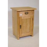 A continental pine bedside cupboard with drawer over single door, 40 x 50cms, 70cm high