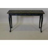 A painted side table, the top decorated in a William Morris inspired design, raised on cabriole