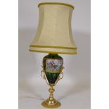 Porcelain table lamp with brass mounts, decorated with a hunting scene, 40cm high, 67cm with shade