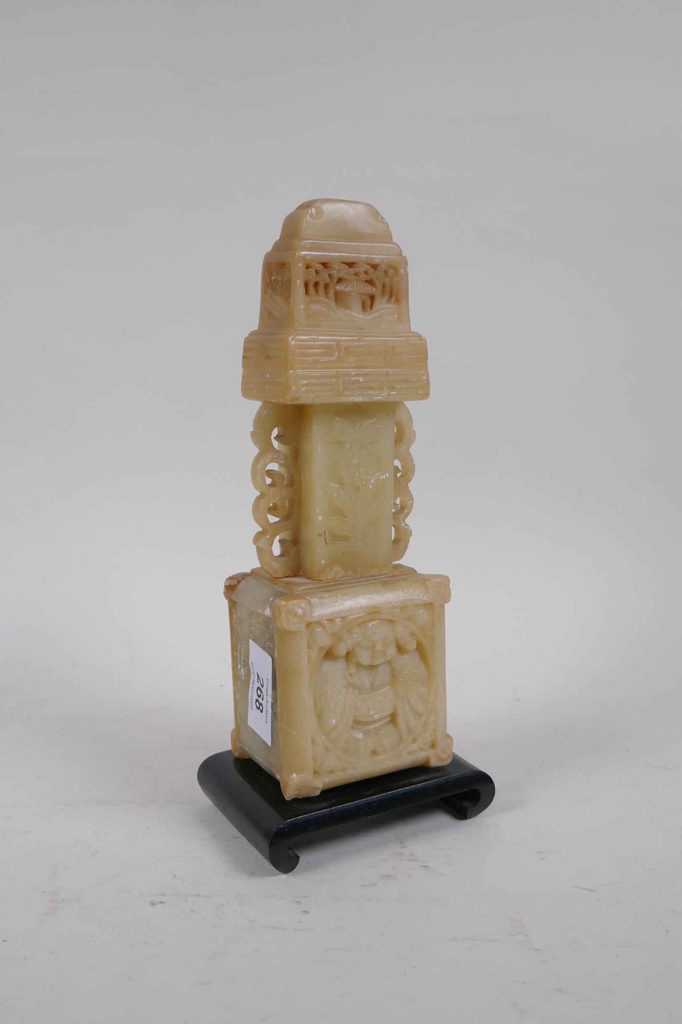 A Chinese carved soapstone stand, mounted on a wood base, 25cm high - Image 2 of 3