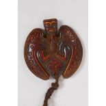 An Oriental moulded pendant in the forma of a bat, 6 x 6cm