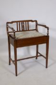 An Edwardian mahogany piano stool with boxwood and burr walnut inlaid decoration and lift up seat,
