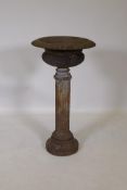 A C19th cast iron pedestal urn, 80cm high