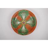 A polychrome porcelain cabinet dish with Chinese cabbage leaf decoration on an orange ground, 6