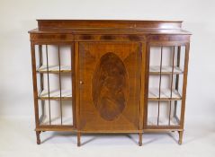 Edwardian inlaid mahogany breakfront display cabinet with two glazed doors flanking a central