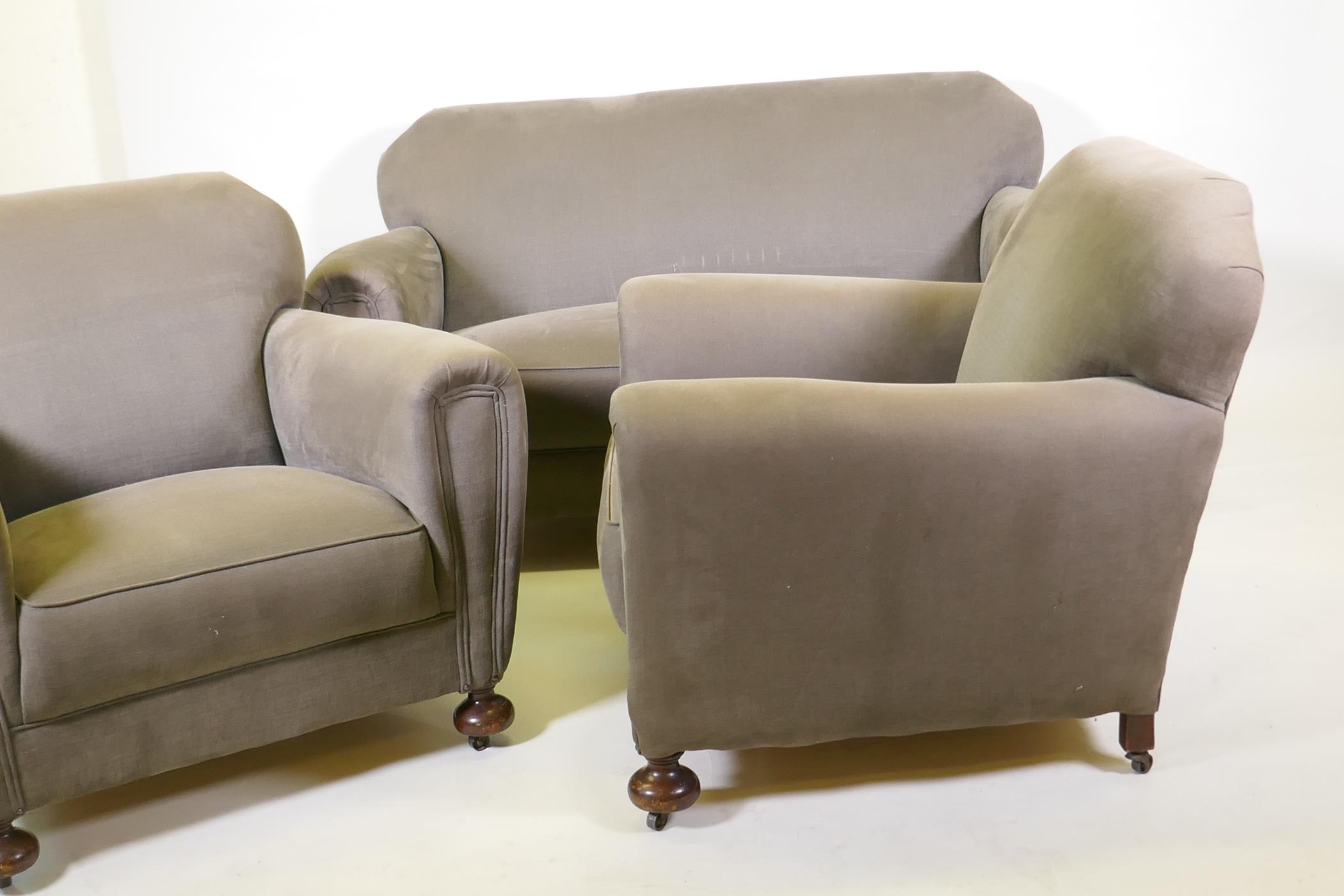 An Art Deco three piece suite, settee and two armchairs, well upholstered in a neutral fabric, 145cm - Image 4 of 6