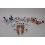 A quantity of antique continental porcelain dolls heads and appendages, together with continental