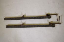 A pair of vintage 'Record' rolled steel sash clamps, 128cm long