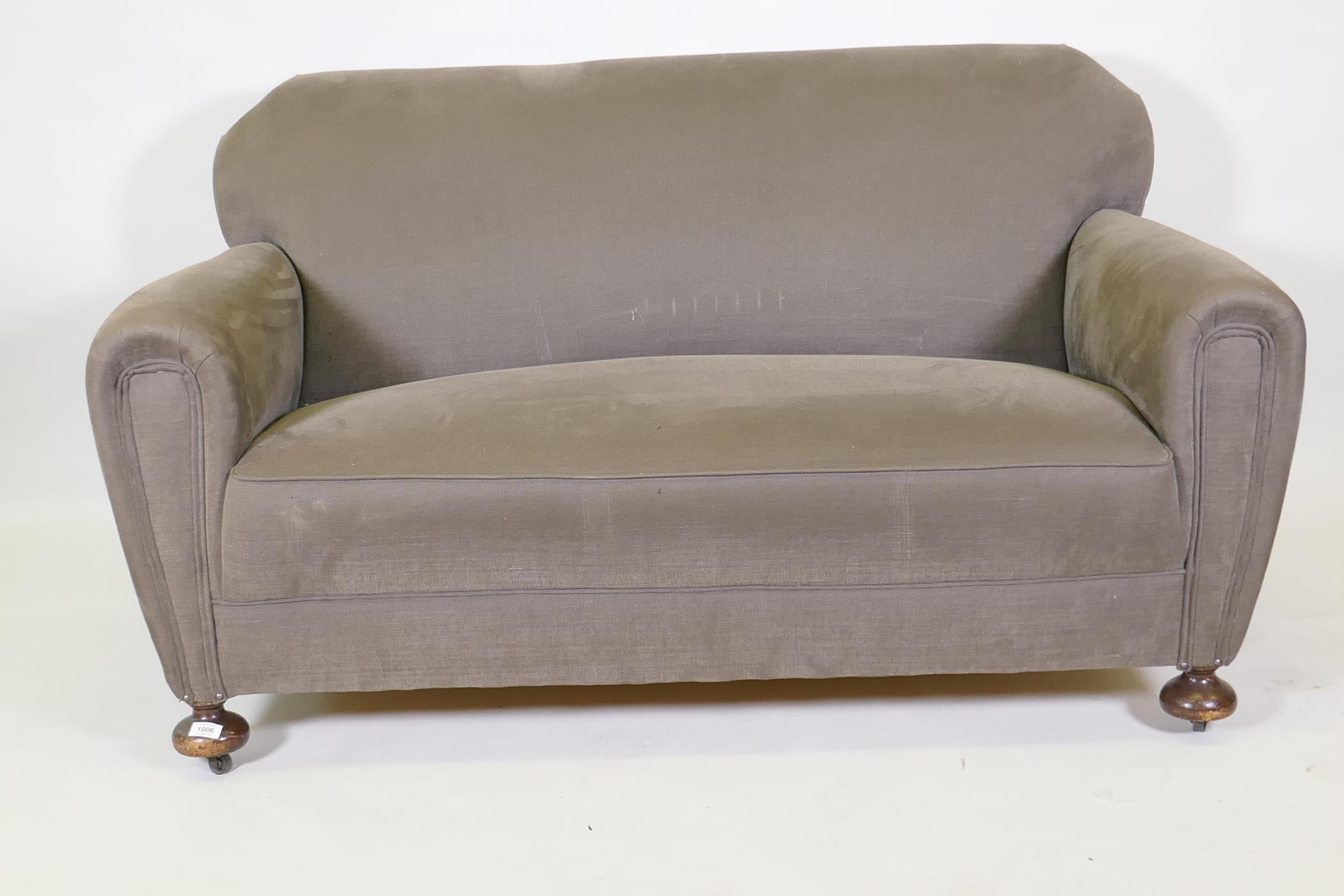 An Art Deco three piece suite, settee and two armchairs, well upholstered in a neutral fabric, 145cm - Image 5 of 6