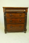 A Victorian mahogany Scotch chest with moulded frieze drawer over three more, flanked by turned