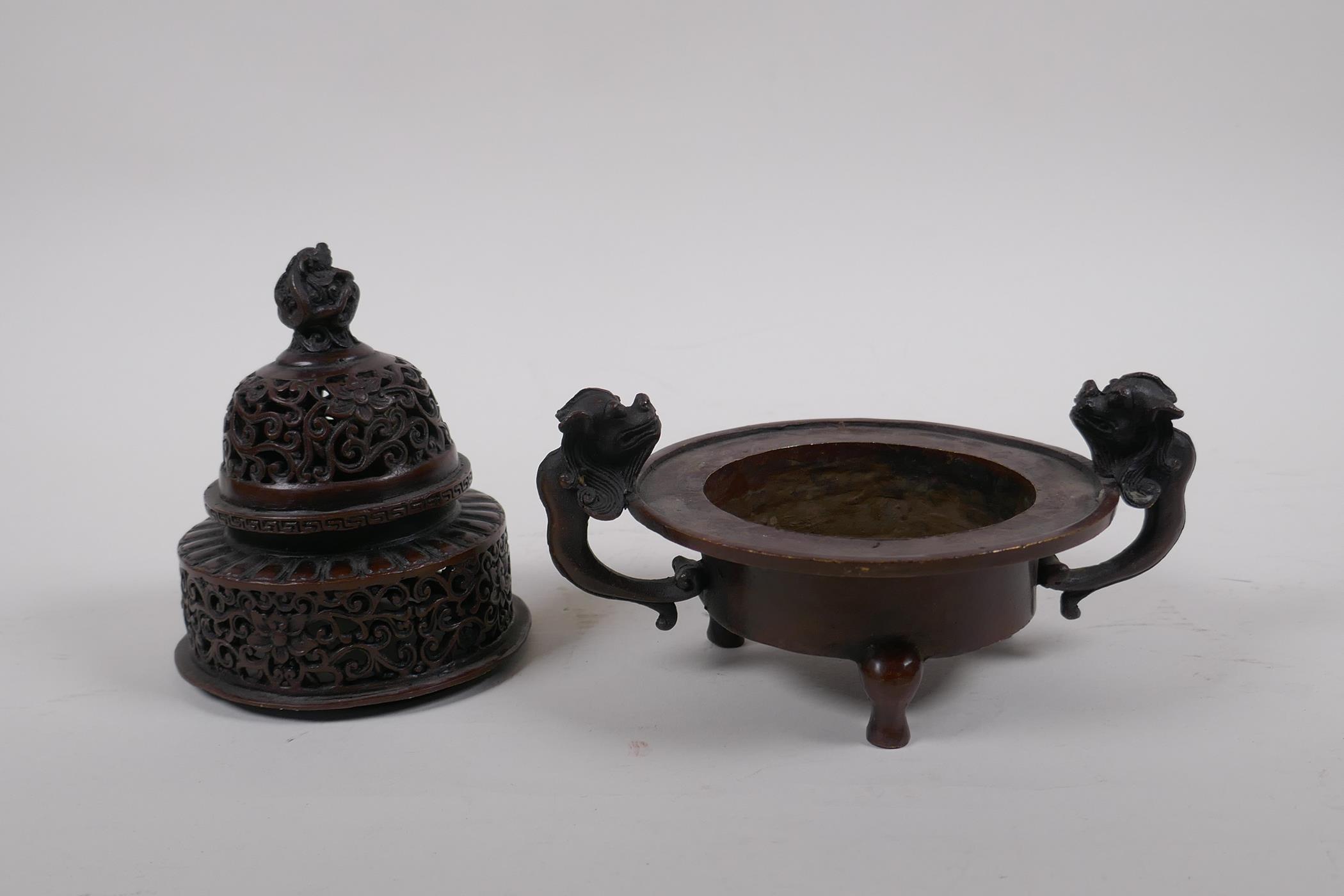 A Chinese bronze two handled censer and cover, with dragon knop and handles, raised on tripod - Image 3 of 5