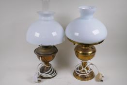 Two brass and glass table lamps in the form of oil lamps, 50cm high