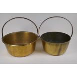 Two C19th brass maslin pans with iron handles, largest 35cm diameter