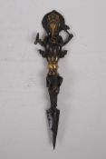 A Tibetan bronzed metal phurba, the handle in the form of Ganesh, 32cm long