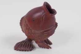 A Japanese carved hardwood posey vase in the form of a fish, signed, 7cm high
