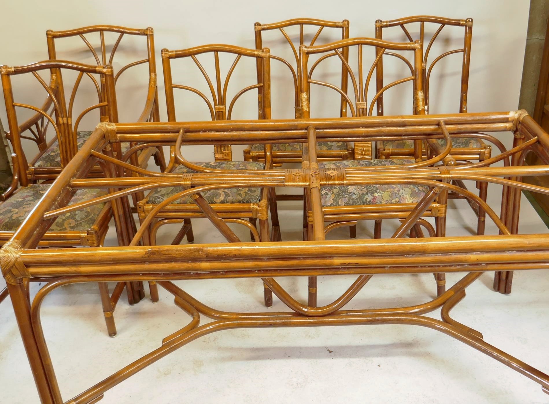A bamboo cane conservatory suite of four + two chairs, and table en suite, 150 x 90cms