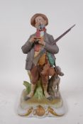 A Naples porcelain figure of a huntsman and hound, 32cm high