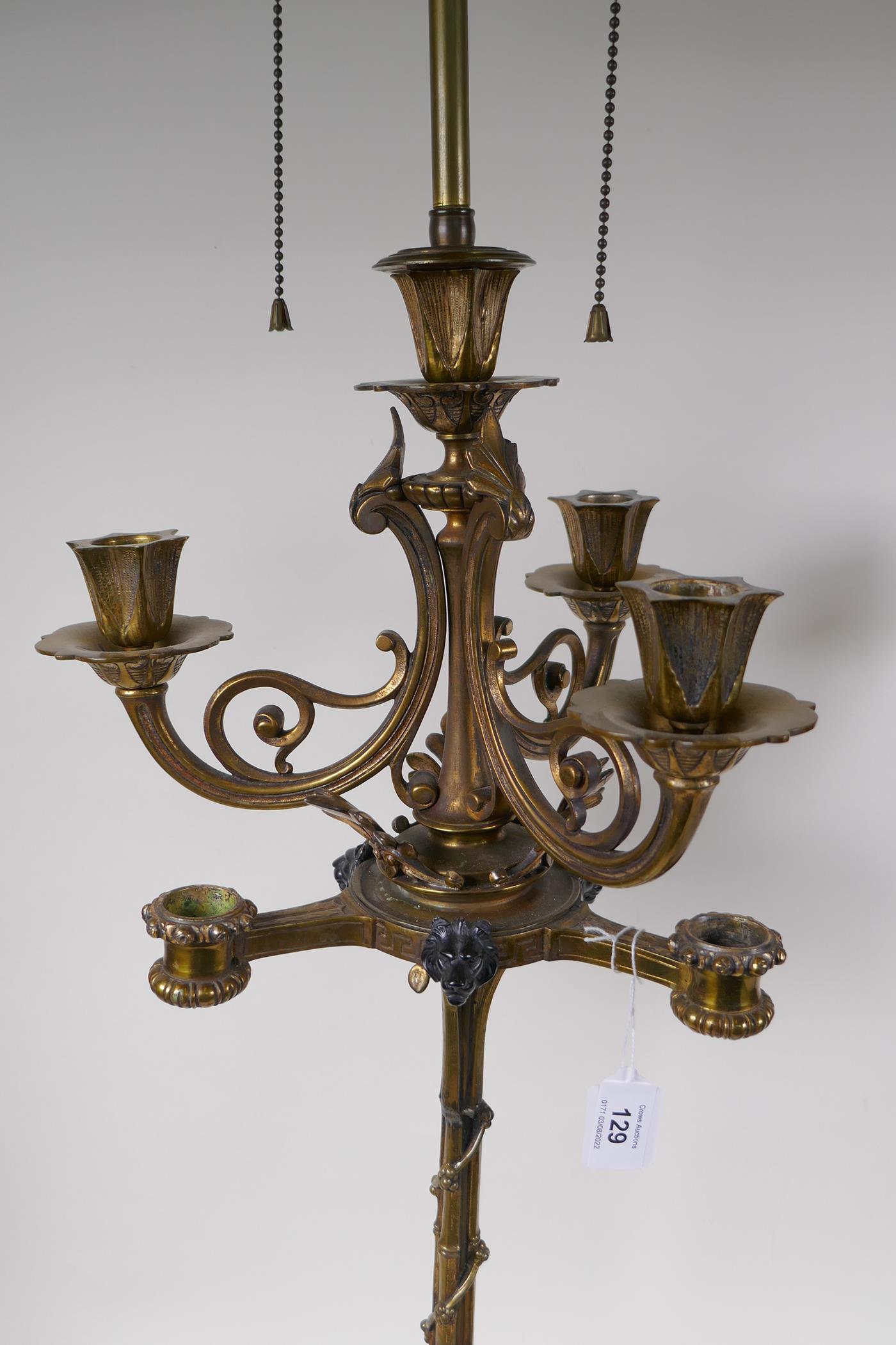 A pair of cold painted brass and three branch table lamps, with silver plated and ormolu detail, - Image 3 of 7