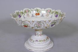 A Sitzendorf porcelain pedestal fruit bowl with flower and fruit decoration and open work bowl, 29 x