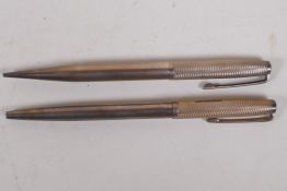 A hallmarked silver Yard-o-Led propelling pencil and ball point pen set, Birmingham 1960