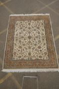 An antique cream ground deep pile wool tabriz carpet, 93" x 74"