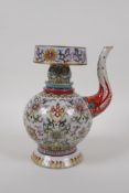 A polychrome porcelain teapot and cover decorated with lotus flowers and the eight Buddhist