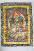 A Tibetan printed thangka 57 x 88cms