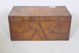 A large C19th figured walnut tea caddy with two compartments and central recess for mixing bowl,