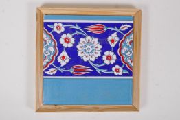 A framed izaic design porcelain tile, tile 20 x 20cms