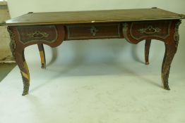 A late C19th/early C20th French parquetry inlaid kingwood bureau-plat with leather inset top ad