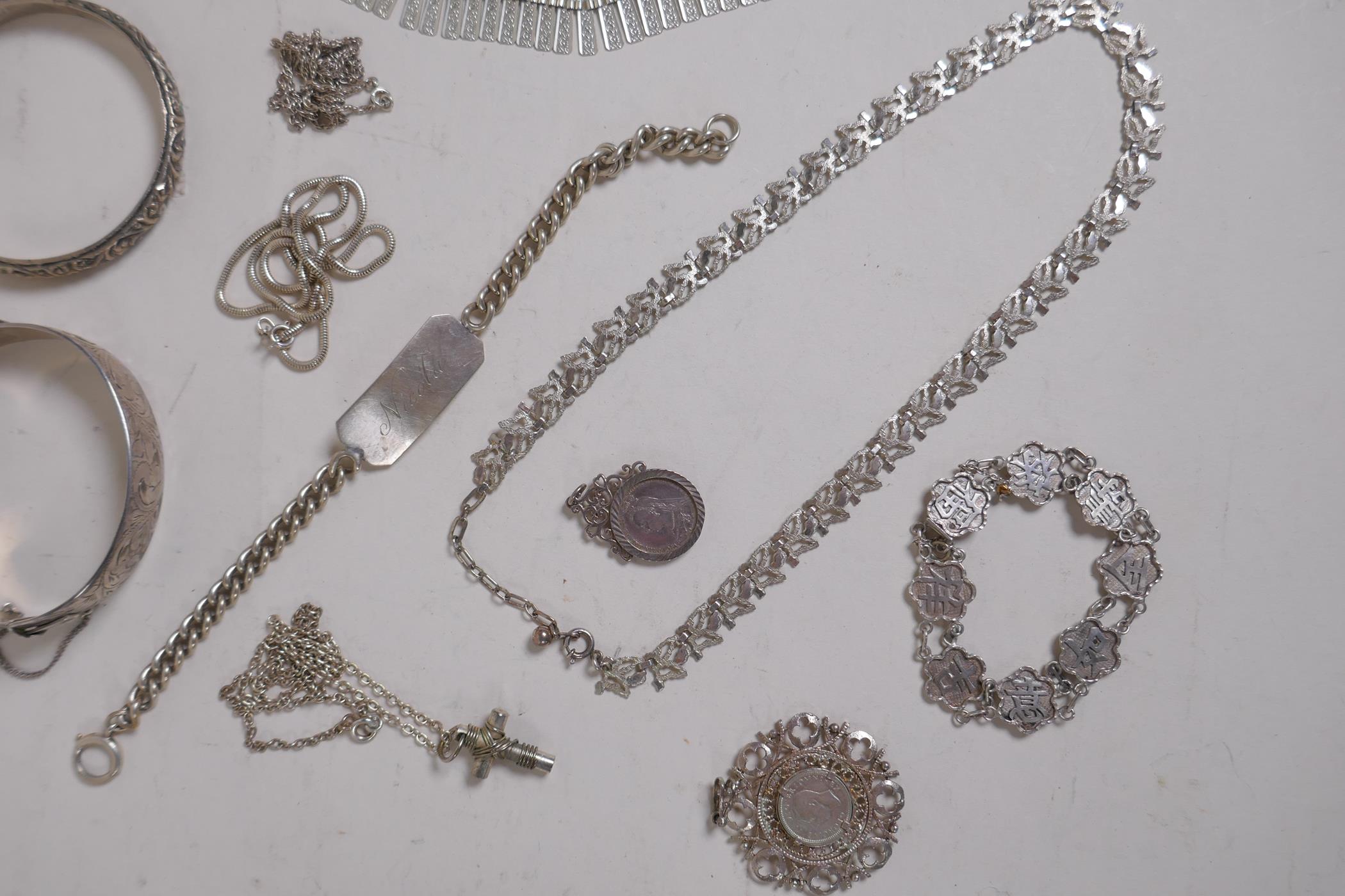 A collection of hallmarked silver jewellery, bangles, chains and necklaces, 199g - Image 4 of 7
