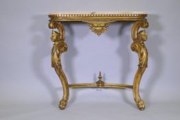 Continental giltwood console table with marble top, dentil and bead frieze and carved supports