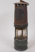 A vintage miner lamp, No 285, 27cm high