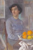 Portrait of a lady seated by a bowl of fruit, inscribed verso 'Guthrie', early C20th oil on canvas