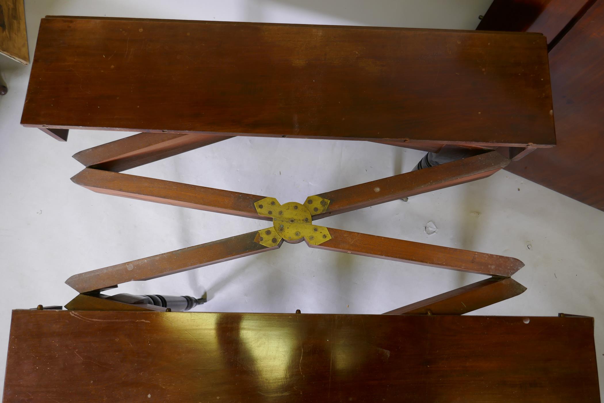 A C19th mahogany drop leaf dining table with concertina action and two extra leaves, one leg AF, 112 - Image 3 of 5