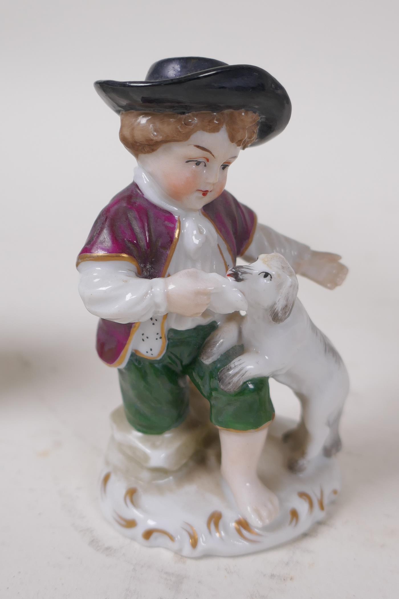 A C19th German porcelain figure of a girl with grapes, 13cm high, and four other continental - Image 3 of 6