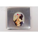 A hallmarked silver cigarette case with later applied enamel plaque of a female nude, Birmingham