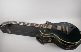 A vintage Japanese built Bradley Les Paul pattern guitar, in fitted hard case, 99cm long, AF