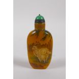 A Chinese yellow Peking glass snuff bottle with enamelled goat decoration, 2 character mark to base,