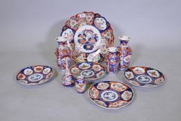 A Meiji Imari charger, a pair of vases, plates etc, 35cm diameter