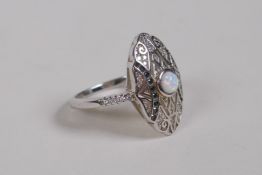 An Art Deco style 925 silver and cubic zirconia ring, set with a central opalite panel, size O